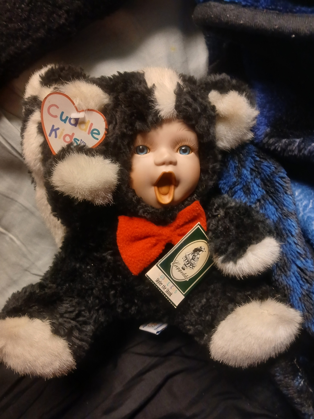 Cuddle Kids Plush Baby Doll in Black & White with Red Bow
